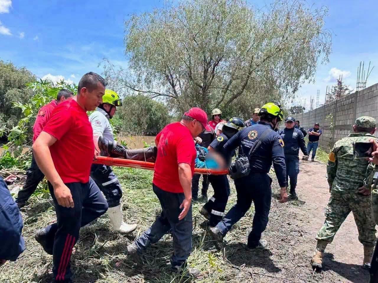 Sube a siete la cifra de muertos por las lluvias en Puebla; siguen labores de búsqueda